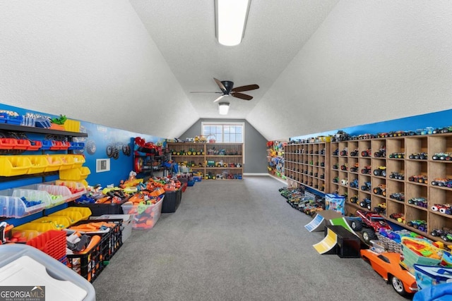 375 Dasher St, Lyons, GA 30436 - playroom featuring carpet, vaulted ceiling, and ceiling fan