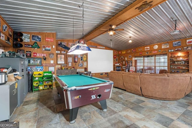 playroom featuring ceiling fan, wooden walls, lofted ceiling with beams, and pool table