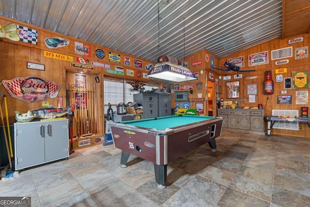 375 Dasher St, Lyons, GA 30436 - recreation room with wood walls, stone finish floor, high vaulted ceiling, and billiards
