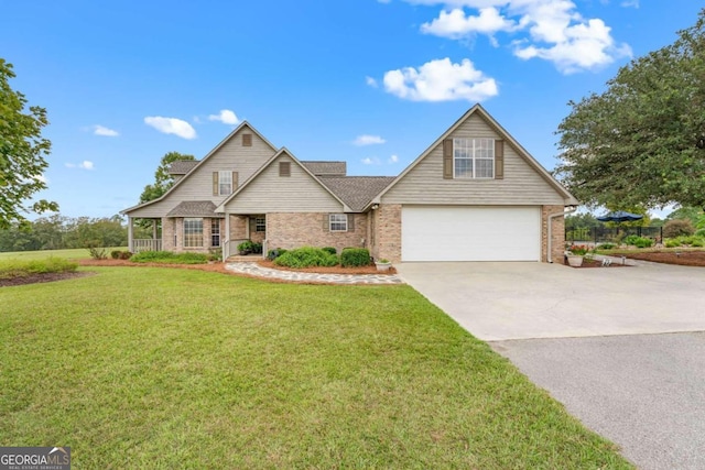 view of front facade featuring a garage, covered porch, and a front lawn