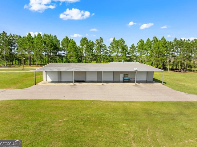 375 Dasher St, Lyons, GA 30436 - exterior space with a garage and a lawn