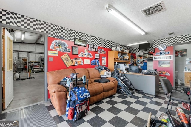 interior space featuring a textured ceiling