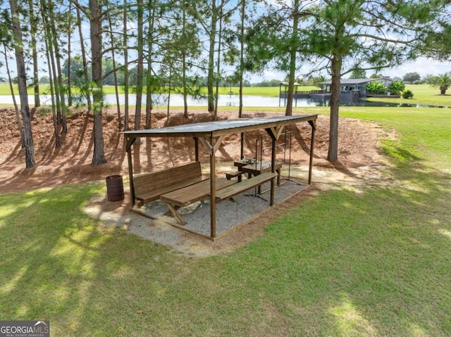 375 Dasher St, Lyons, GA 30436 - view of community with a water view and a yard