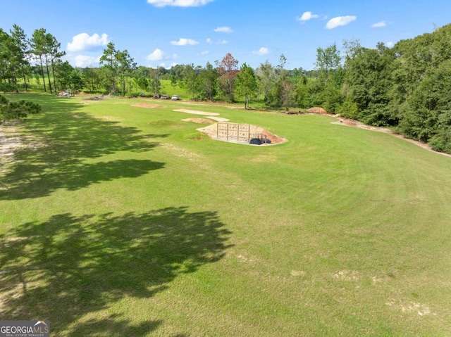 view of community featuring a lawn