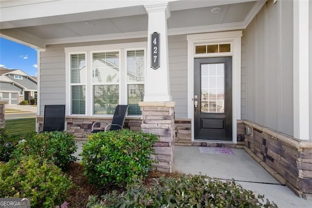 entrance to property with a porch