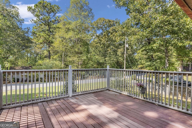 deck featuring a water view