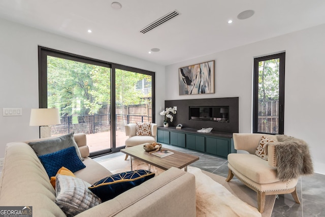 living room with a healthy amount of sunlight