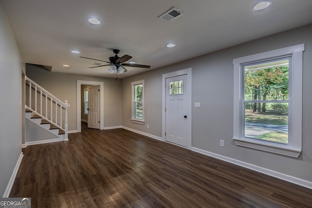 entryway featuring ceiling fan and dark hardwood / wood-style flooring