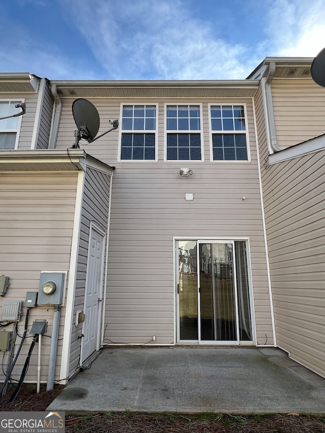 rear view of house with a patio area