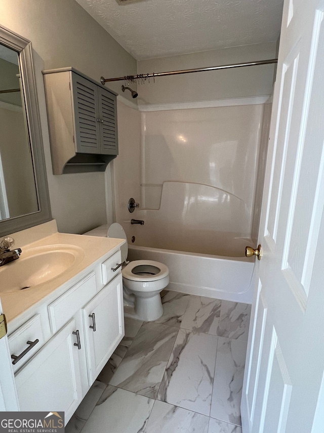 full bathroom featuring vanity, shower / bath combination, a textured ceiling, and toilet