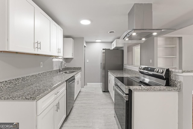 kitchen featuring white cabinetry, sink, island range hood, and appliances with stainless steel finishes