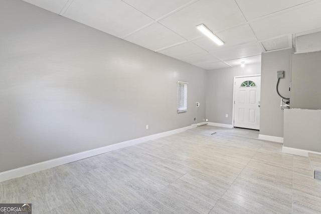 interior space featuring baseboards