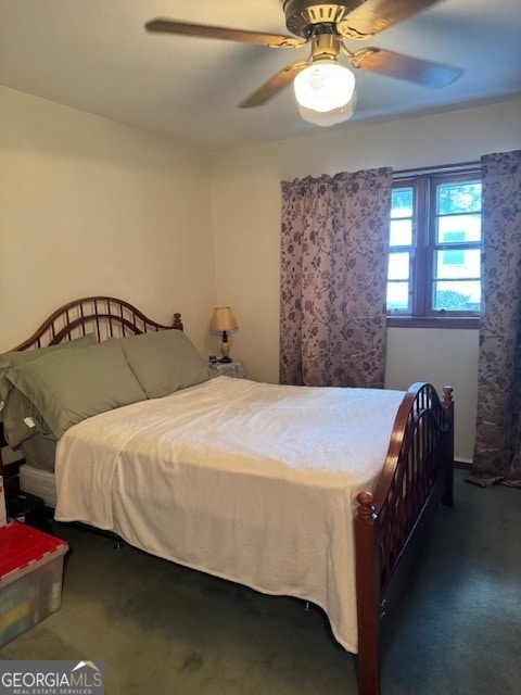 carpeted bedroom featuring ceiling fan