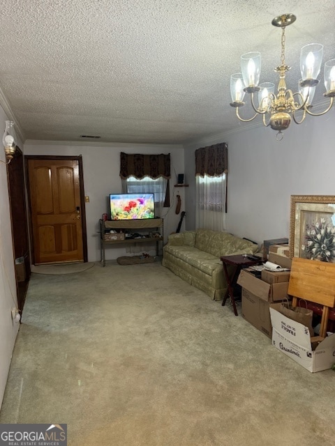 carpeted living room featuring a textured ceiling and a chandelier