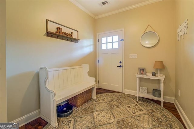 foyer entrance featuring ornamental molding and wood-type flooring