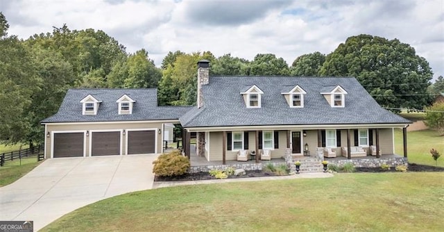 cape cod house with a front yard and a porch