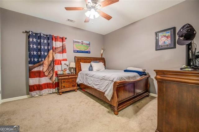 bedroom with ceiling fan and carpet flooring