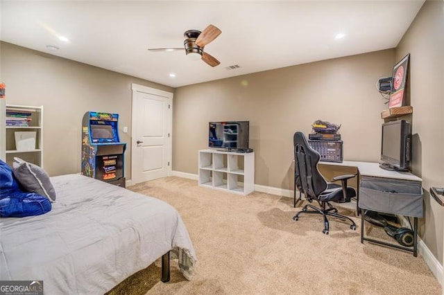 bedroom featuring ceiling fan and light colored carpet