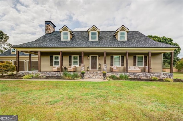 view of front facade featuring covered porch and a front yard