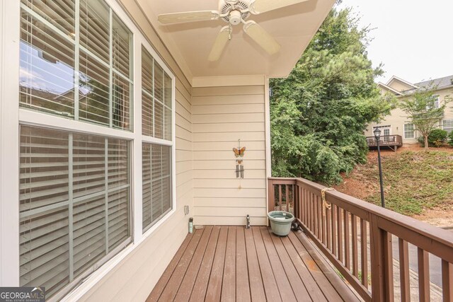 balcony featuring ceiling fan