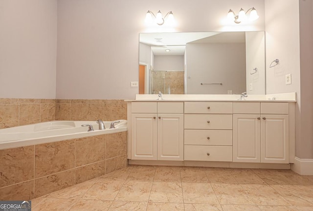 full bathroom with double vanity, a sink, a bath, and a shower stall