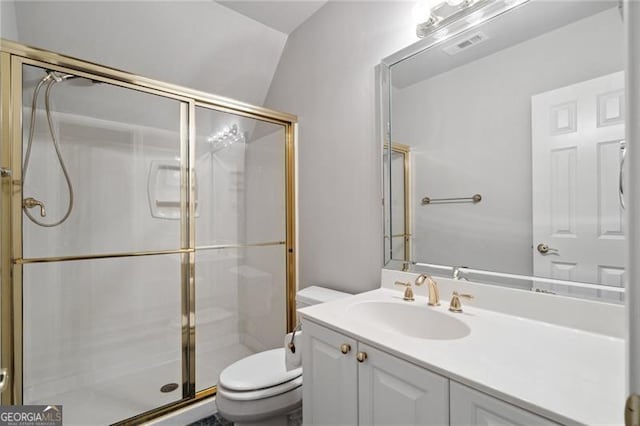 bathroom with walk in shower, vanity, toilet, and vaulted ceiling