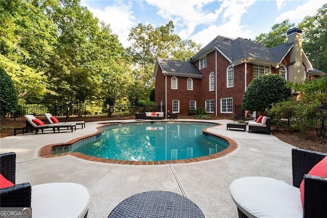 view of pool with a patio area