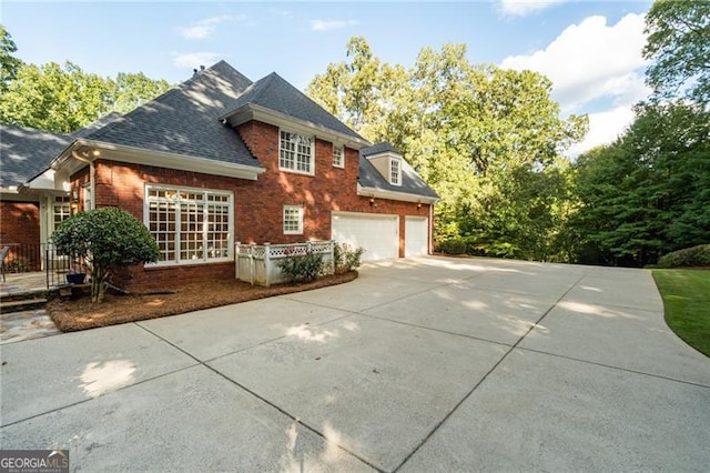 view of property exterior featuring a garage