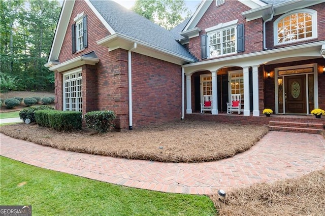 view of front of home featuring covered porch