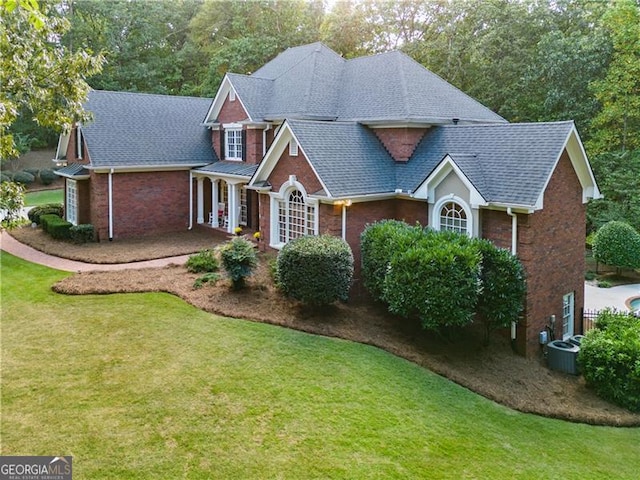 front facade with a front lawn