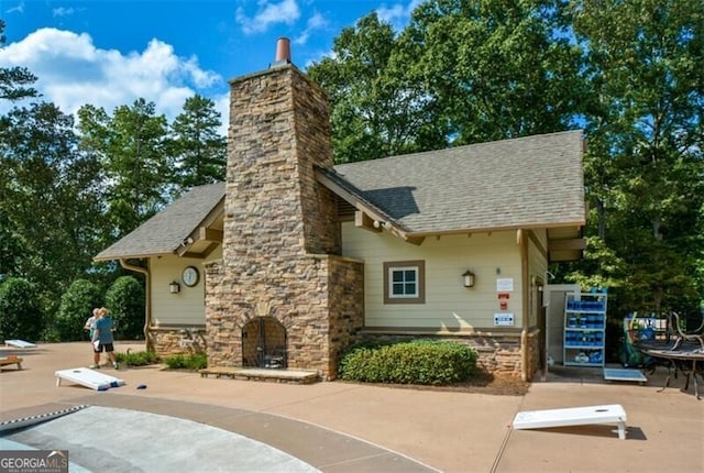 view of property's community with a patio