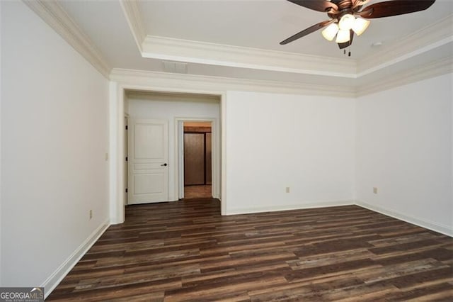 unfurnished room featuring ceiling fan, dark hardwood / wood-style floors, and ornamental molding