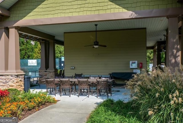 view of patio featuring ceiling fan