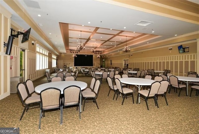 carpeted dining space with coffered ceiling, beam ceiling, and an inviting chandelier