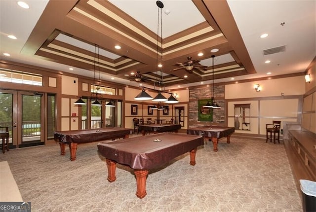 recreation room with french doors, ornamental molding, light colored carpet, a raised ceiling, and billiards