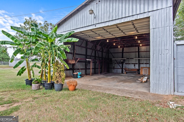 garage featuring a yard