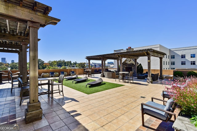 view of patio with a pergola and an outdoor living space