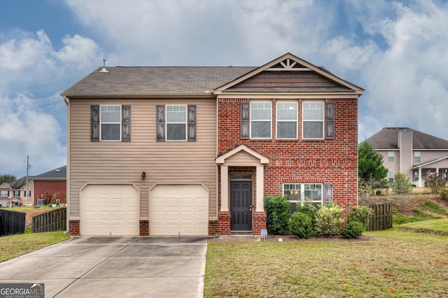 view of front of house with a garage and a front lawn