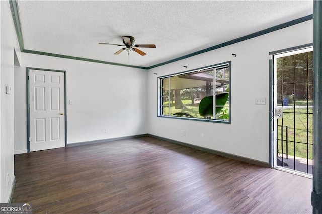 unfurnished room featuring ceiling fan, dark hardwood / wood-style floors, and a textured ceiling