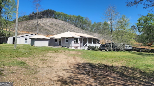 ranch-style house with a front yard