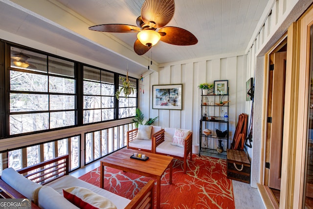 interior space with light wood-type flooring and ceiling fan