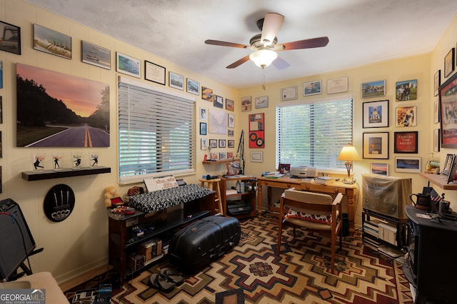 office area with ceiling fan