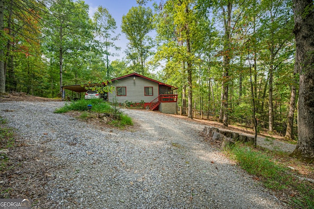 view of home's exterior featuring a deck