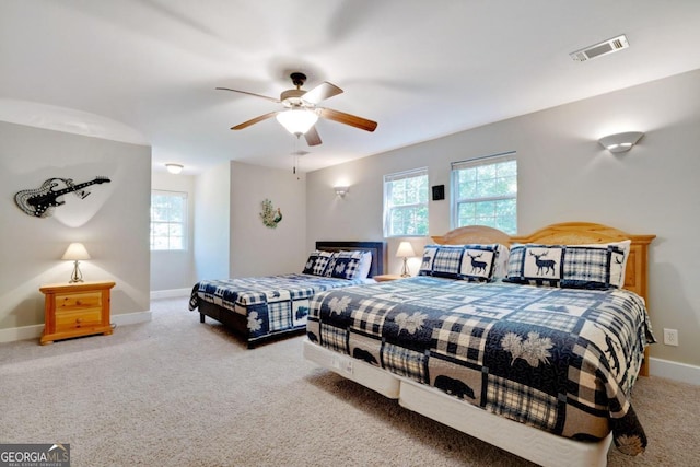 bedroom with carpet and ceiling fan