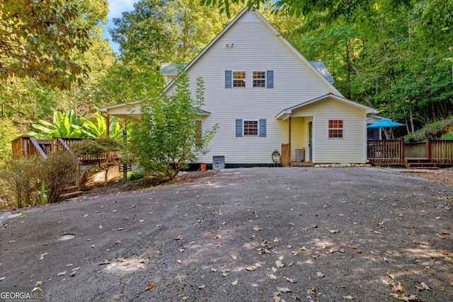 view of front of property featuring a deck