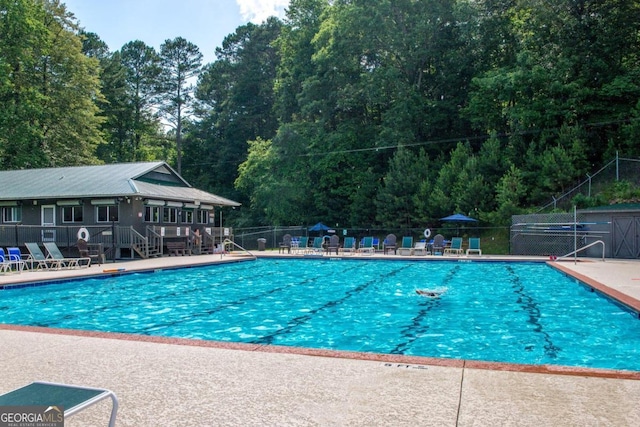 view of pool featuring a patio