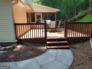 deck featuring a sunroom