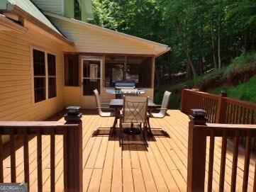 wooden deck with grilling area