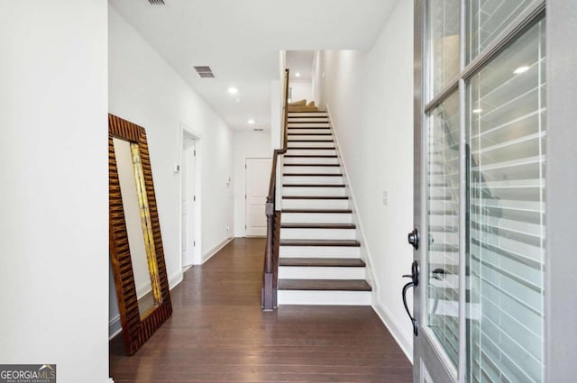 interior space with dark hardwood / wood-style floors