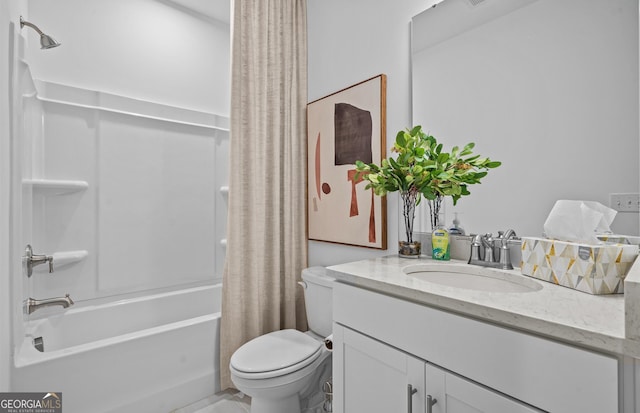 full bathroom with vanity, shower / tub combo with curtain, and toilet